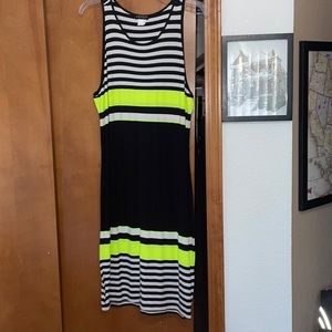 Pretty summer dress. Stretch material, never worn.  Cute with flats or heels